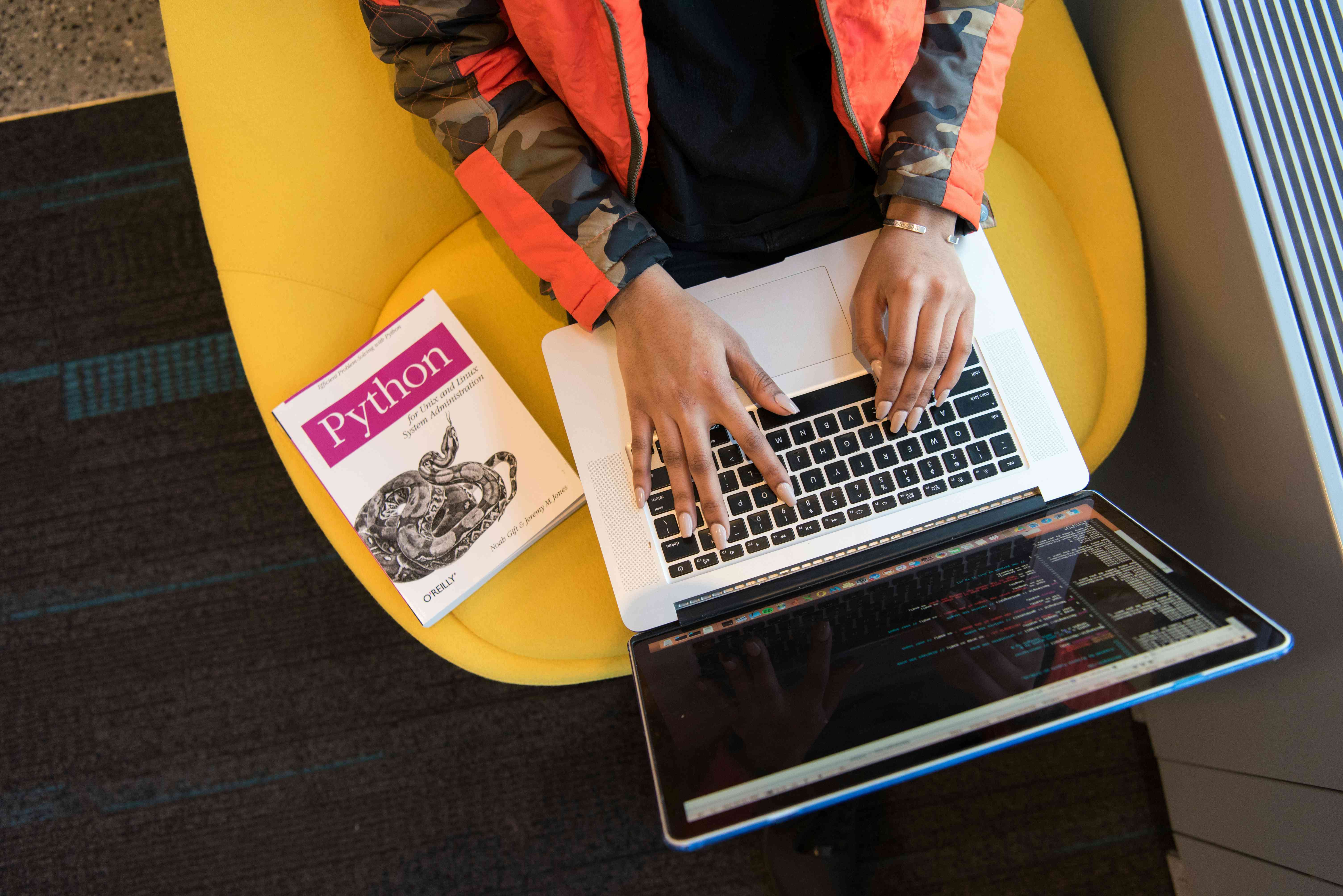 techy-girl-typing-on-a-laptop